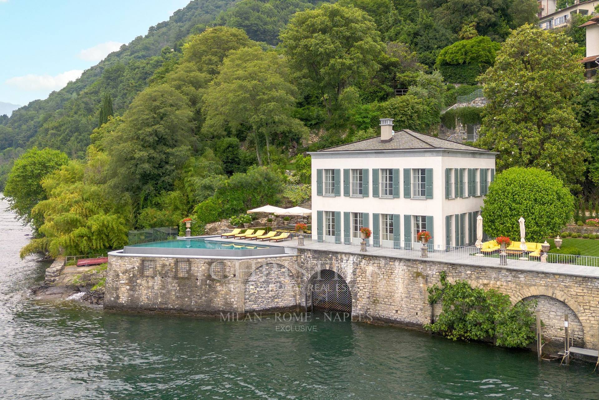 picture of Prestigious Pied-dans-l'eau Villa On Lake Como With Infinity Pool, Dock And Private Boat