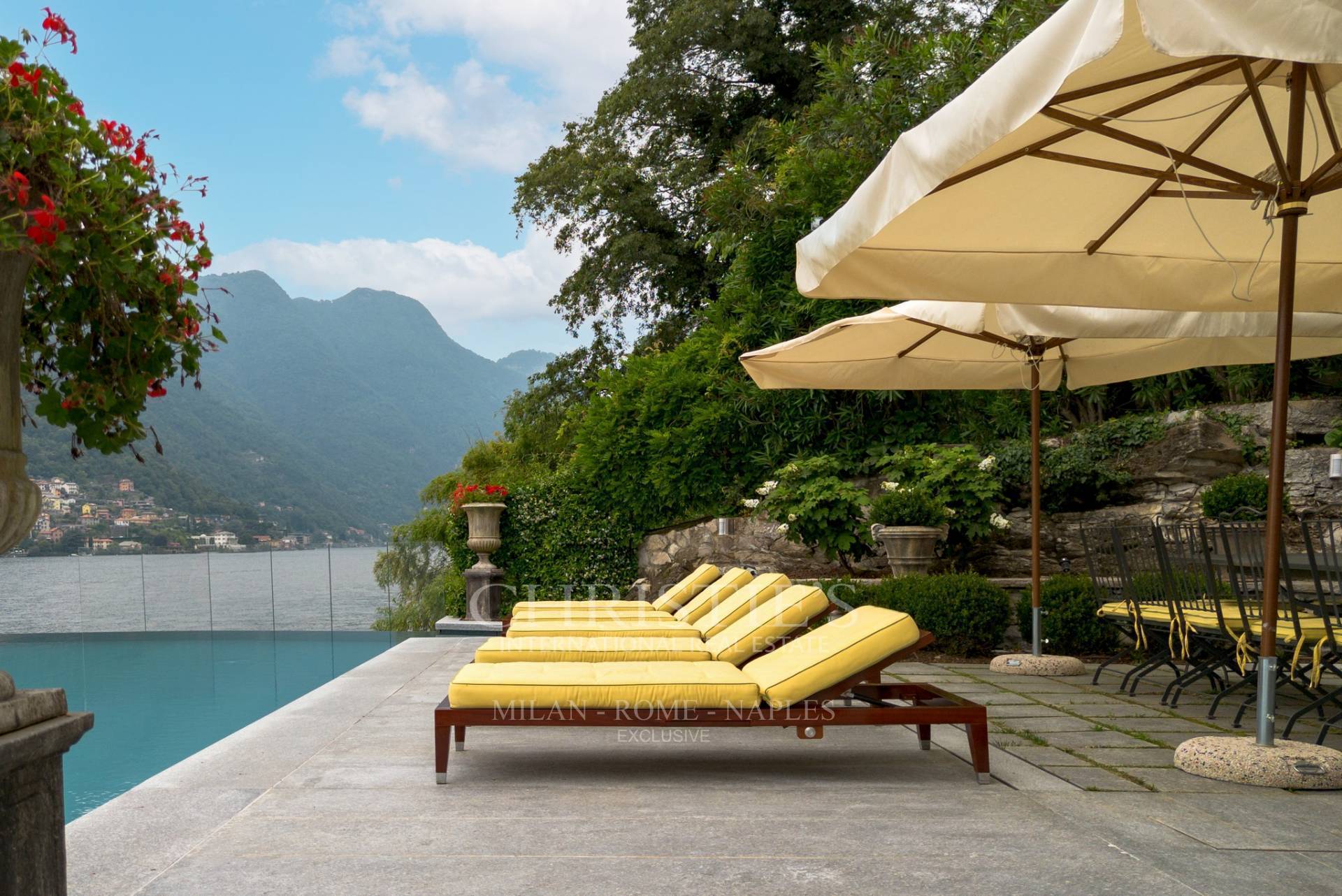 picture of Prestigious Pied-dans-l'eau Villa On Lake Como With Infinity Pool, Dock And Private Boat