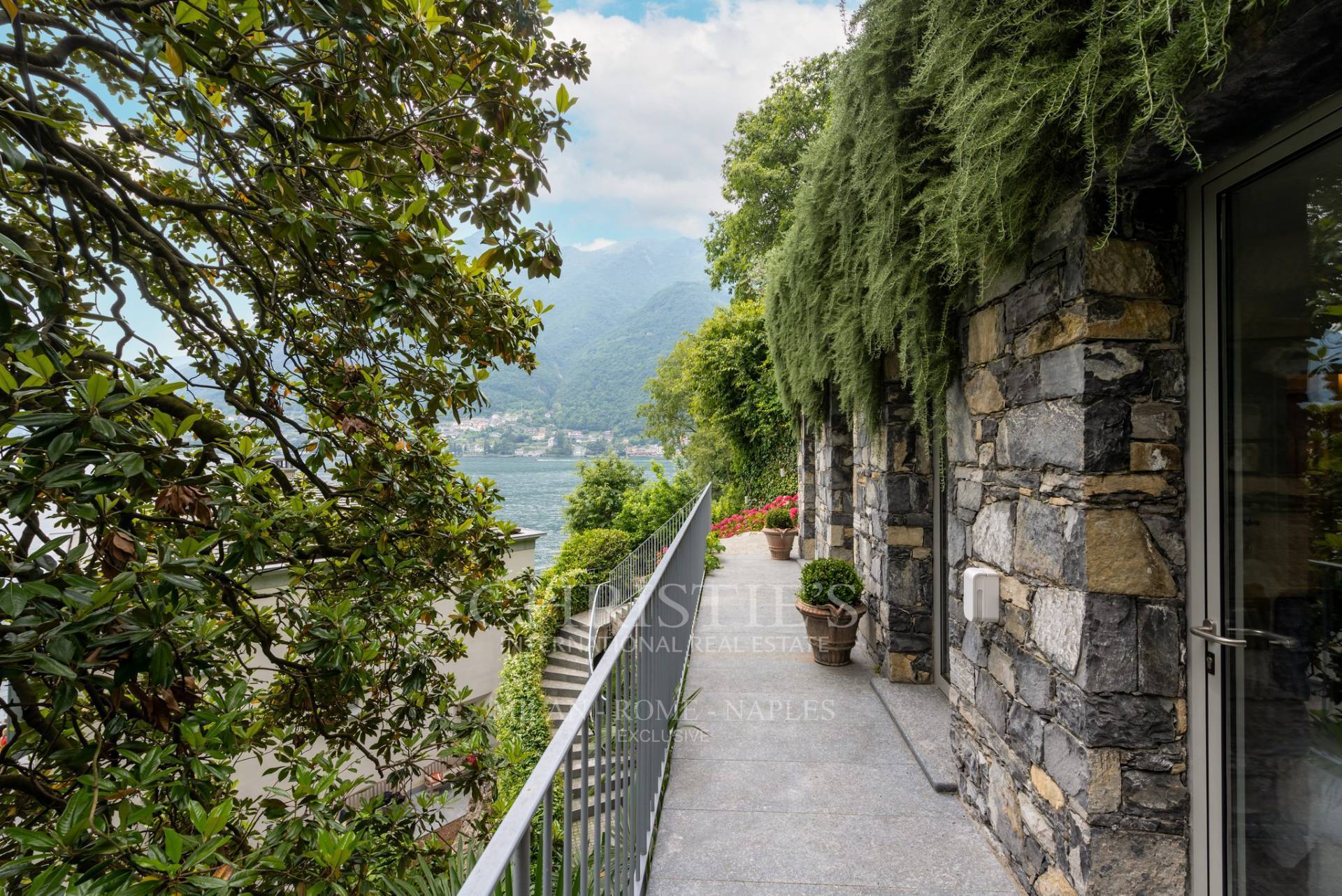 picture of Prestigious Pied-dans-l'eau Villa On Lake Como With Infinity Pool, Dock And Private Boat