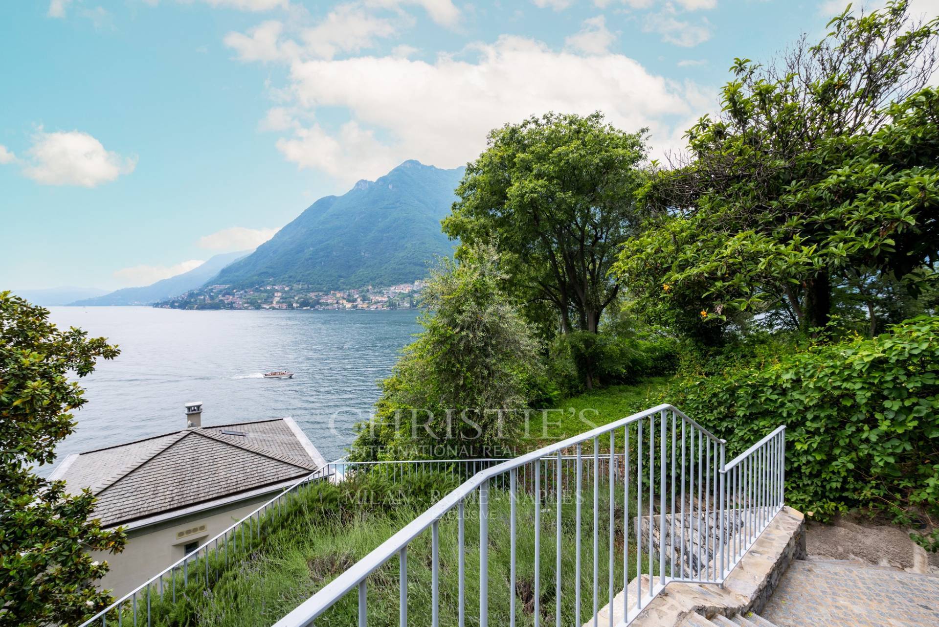 picture of Prestigious Pied-dans-l'eau Villa On Lake Como With Infinity Pool, Dock And Private Boat