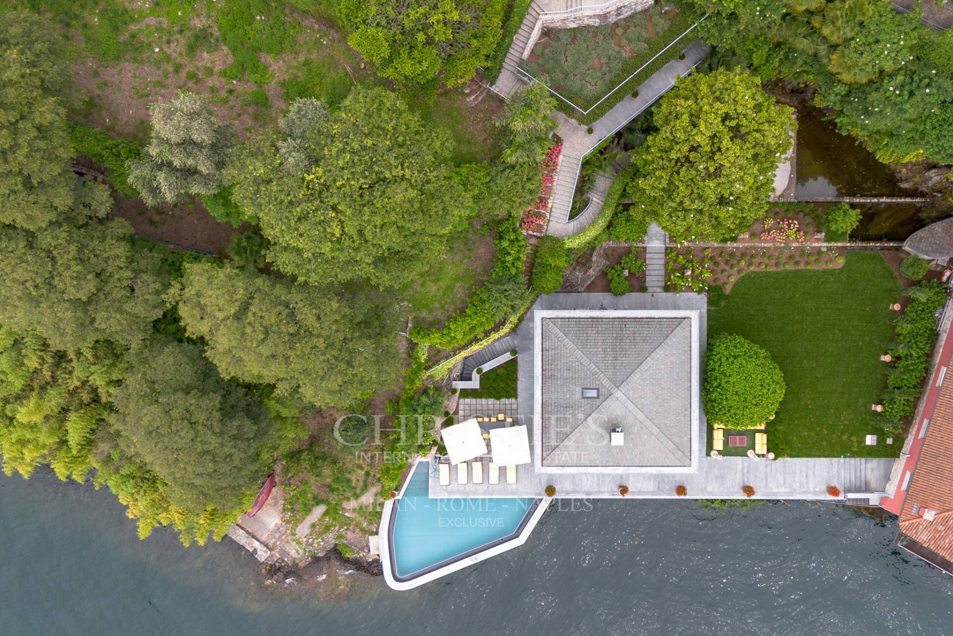 picture of Prestigious Pied-dans-l'eau Villa On Lake Como With Infinity Pool, Dock And Private Boat