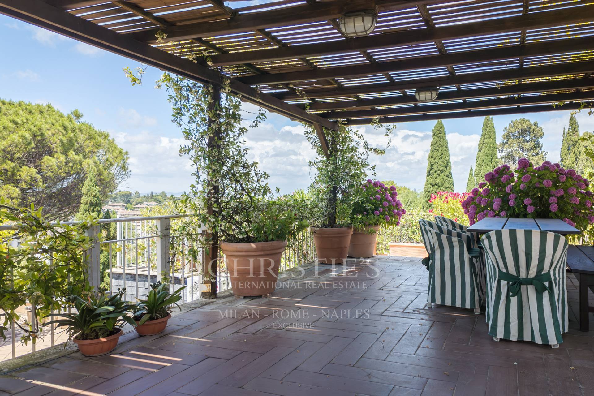 picture of Representative Penthouse Surrounded By Green.