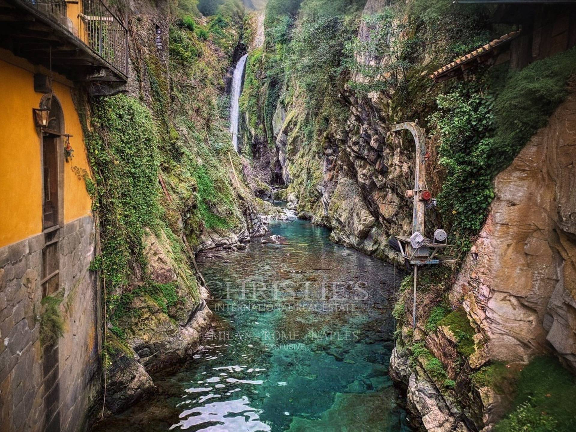 picture of Ancient Lakefront Spinning Mill In Nesso