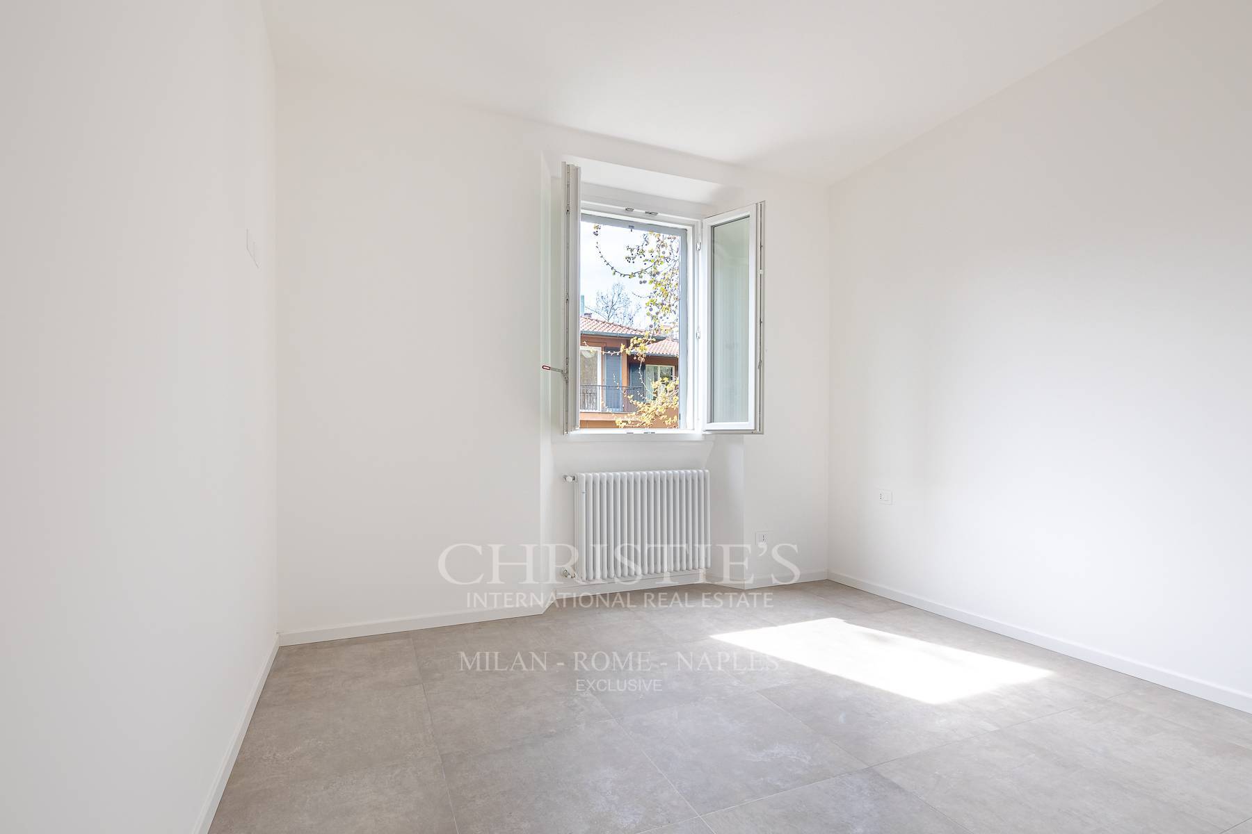 picture of Renovated Apartment With A View Of The Greenery In The Quadronno District
