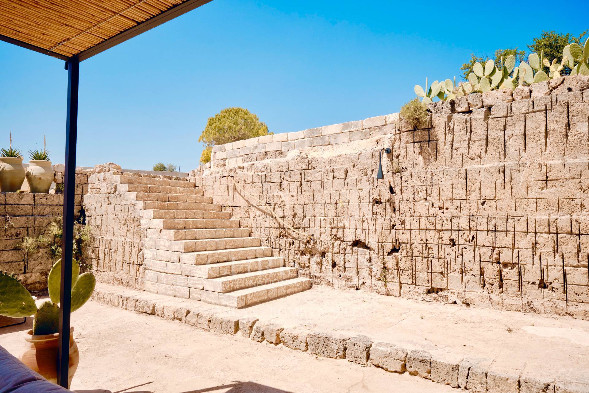 picture of Designer Glass House In An Ancient Stone Quarry With Sea And Val Di Noto Views