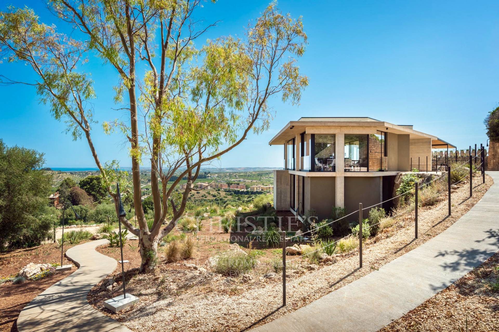 picture of Designer Glass House In An Ancient Stone Quarry With Sea And Val Di Noto Views