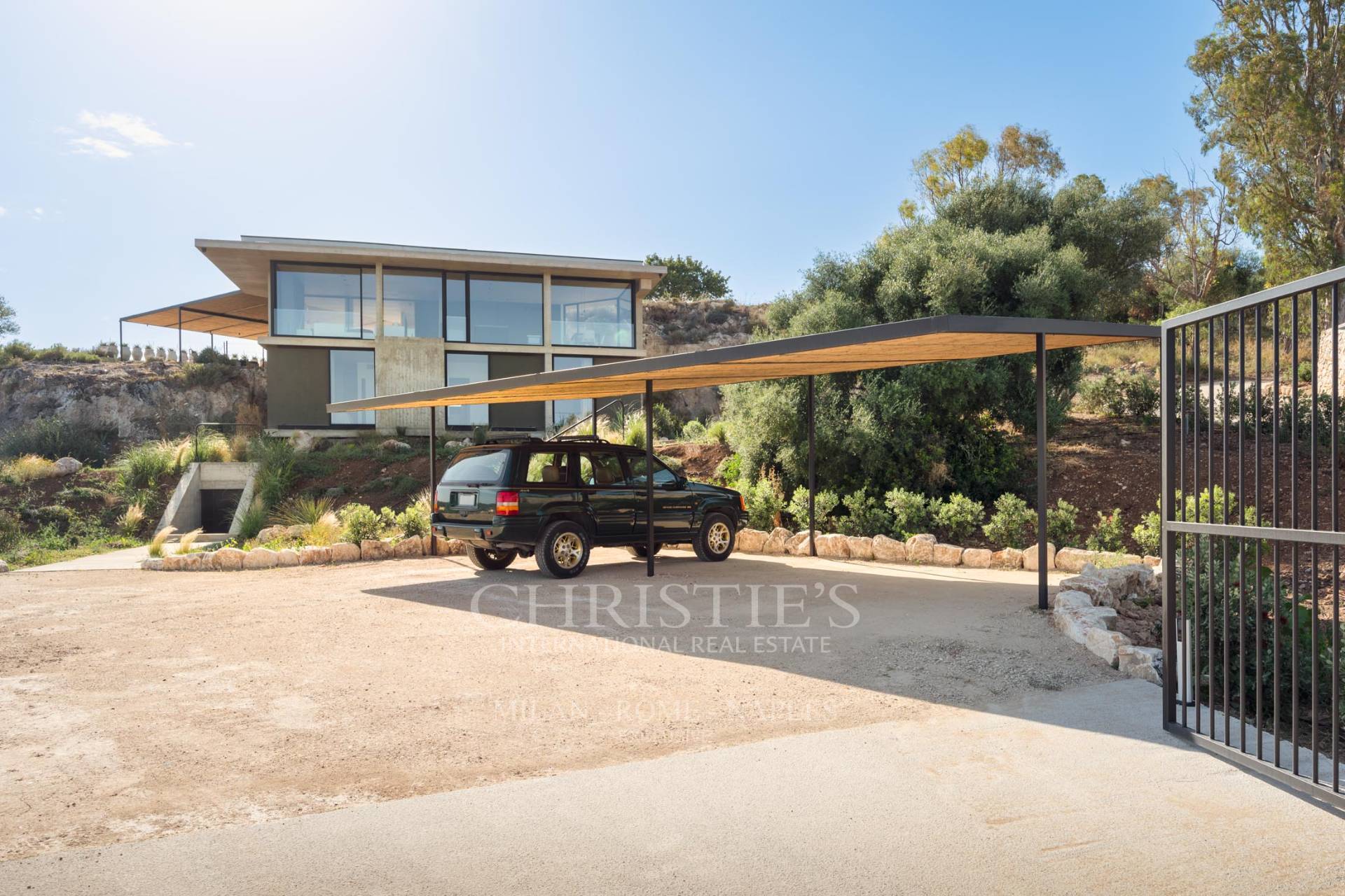 picture of Designer Glass House In An Ancient Stone Quarry With Sea And Val Di Noto Views