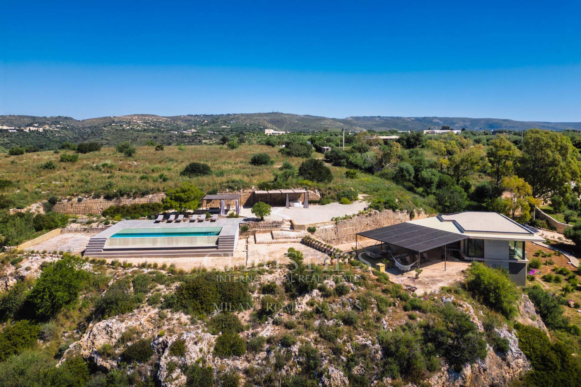 picture of Designer Glass House In An Ancient Stone Quarry With Sea And Val Di Noto Views