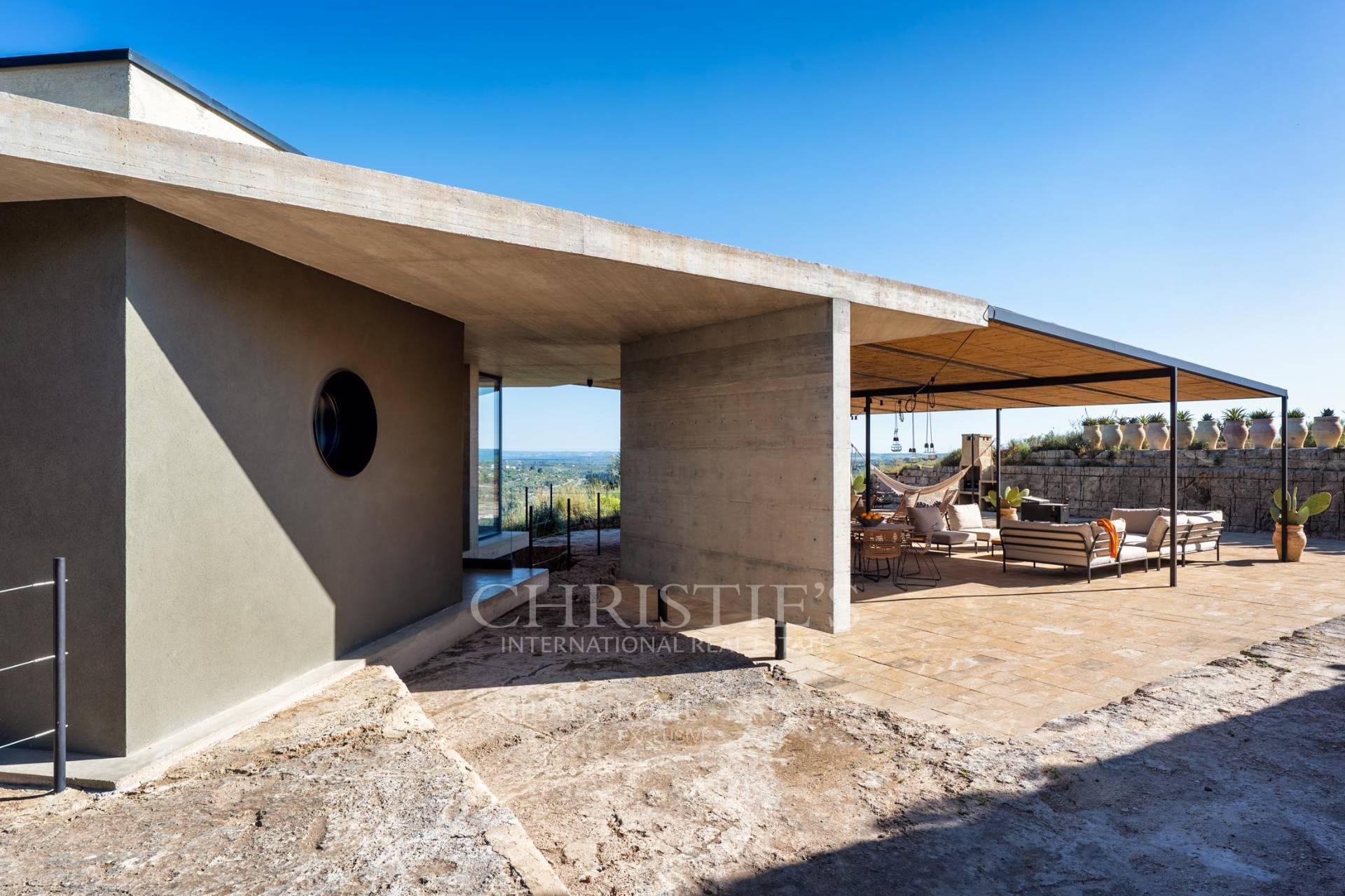 picture of Designer Glass House In An Ancient Stone Quarry With Sea And Val Di Noto Views