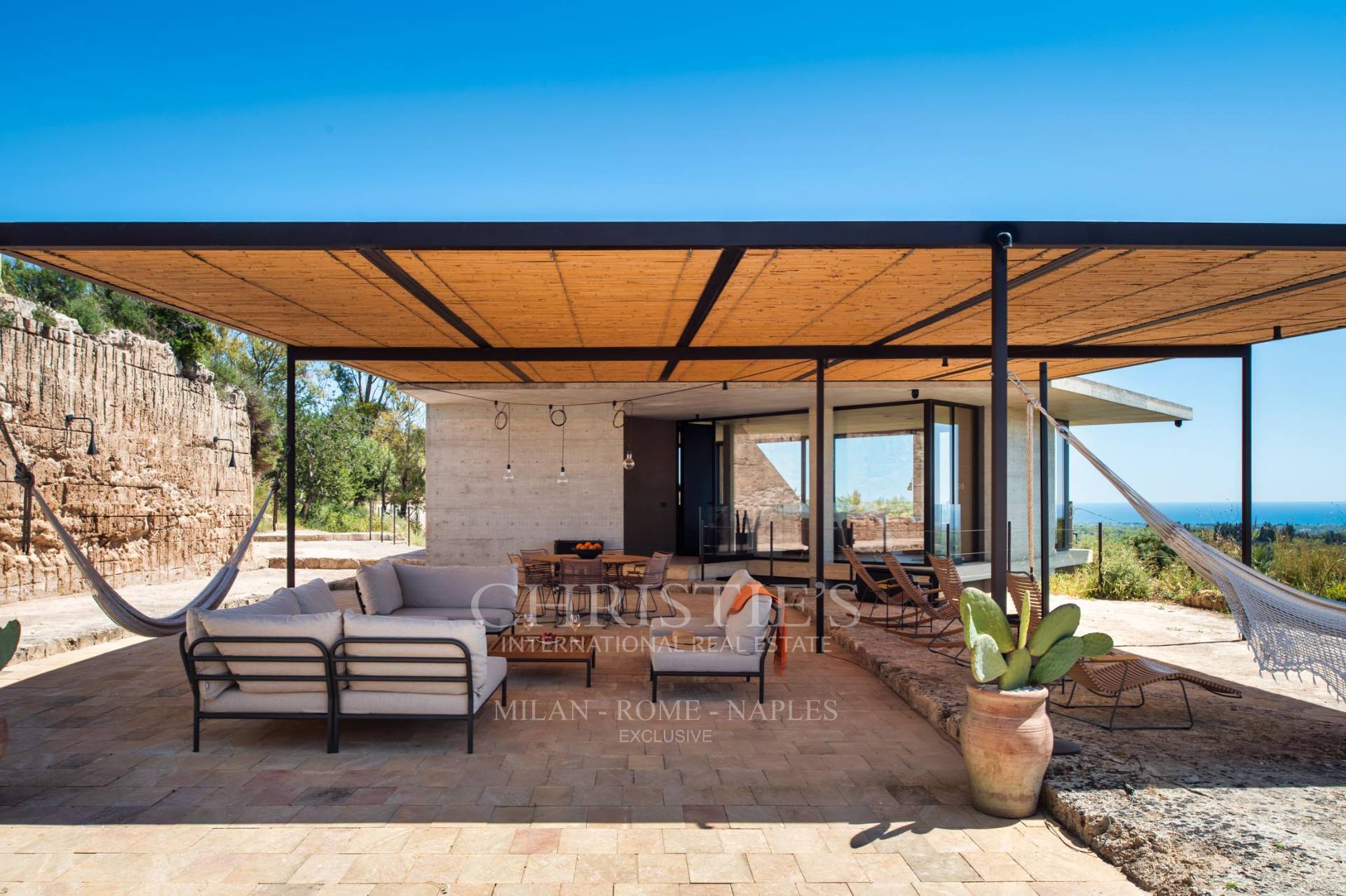 picture of Designer Glass House In An Ancient Stone Quarry With Sea And Val Di Noto Views