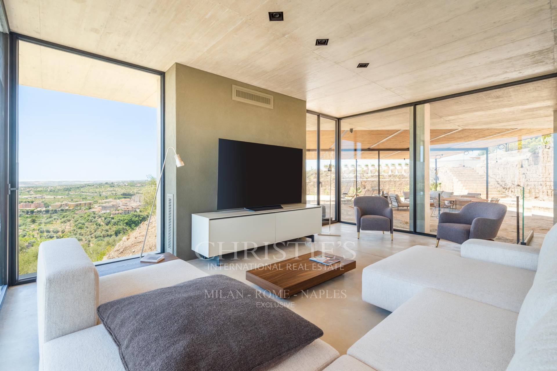 picture of Designer Glass House In An Ancient Stone Quarry With Sea And Val Di Noto Views