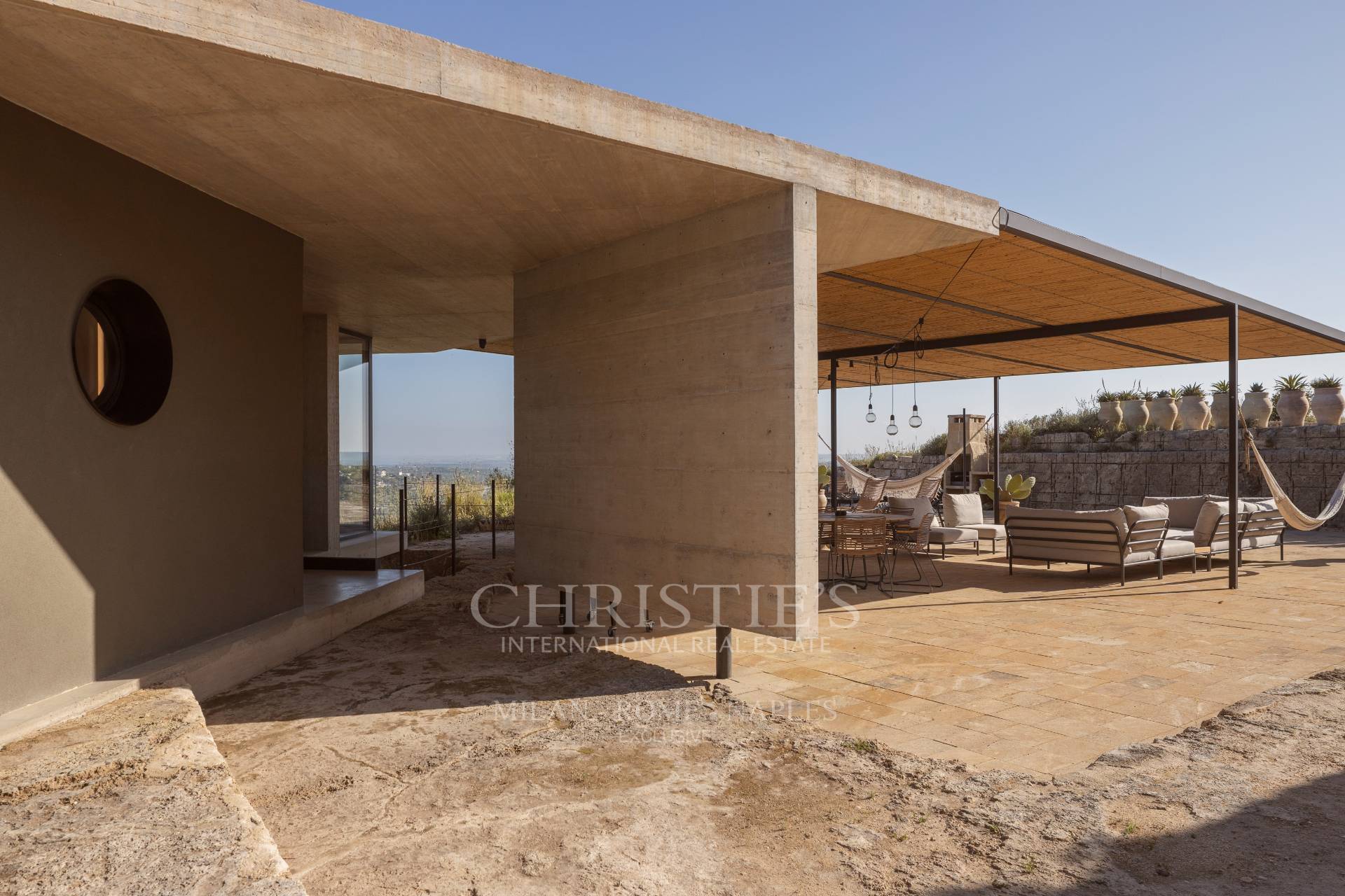 picture of Designer Glass House In An Ancient Stone Quarry With Sea And Val Di Noto Views