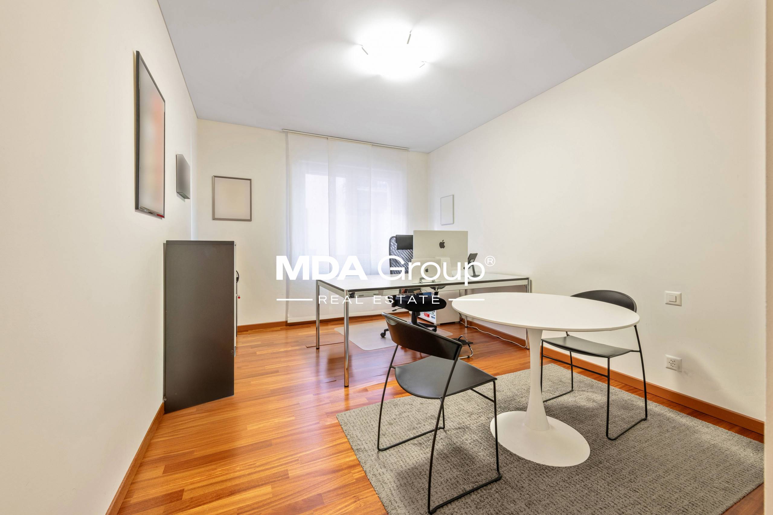UFFICIO IN CENTRO CITTÀ CON VISTA SUL LAGO