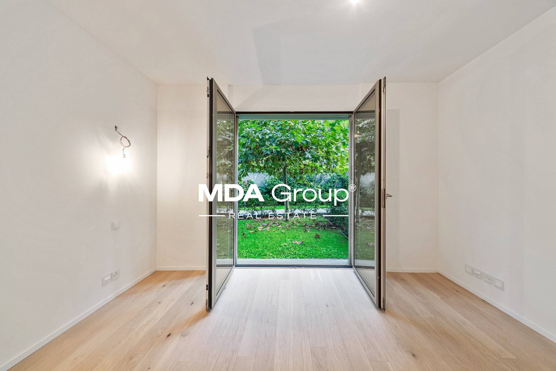 MAGNIFICO APPARTAMENTO CON GIARDINO IN ESCLUSIVO CONTESTO ALBERGHIERO