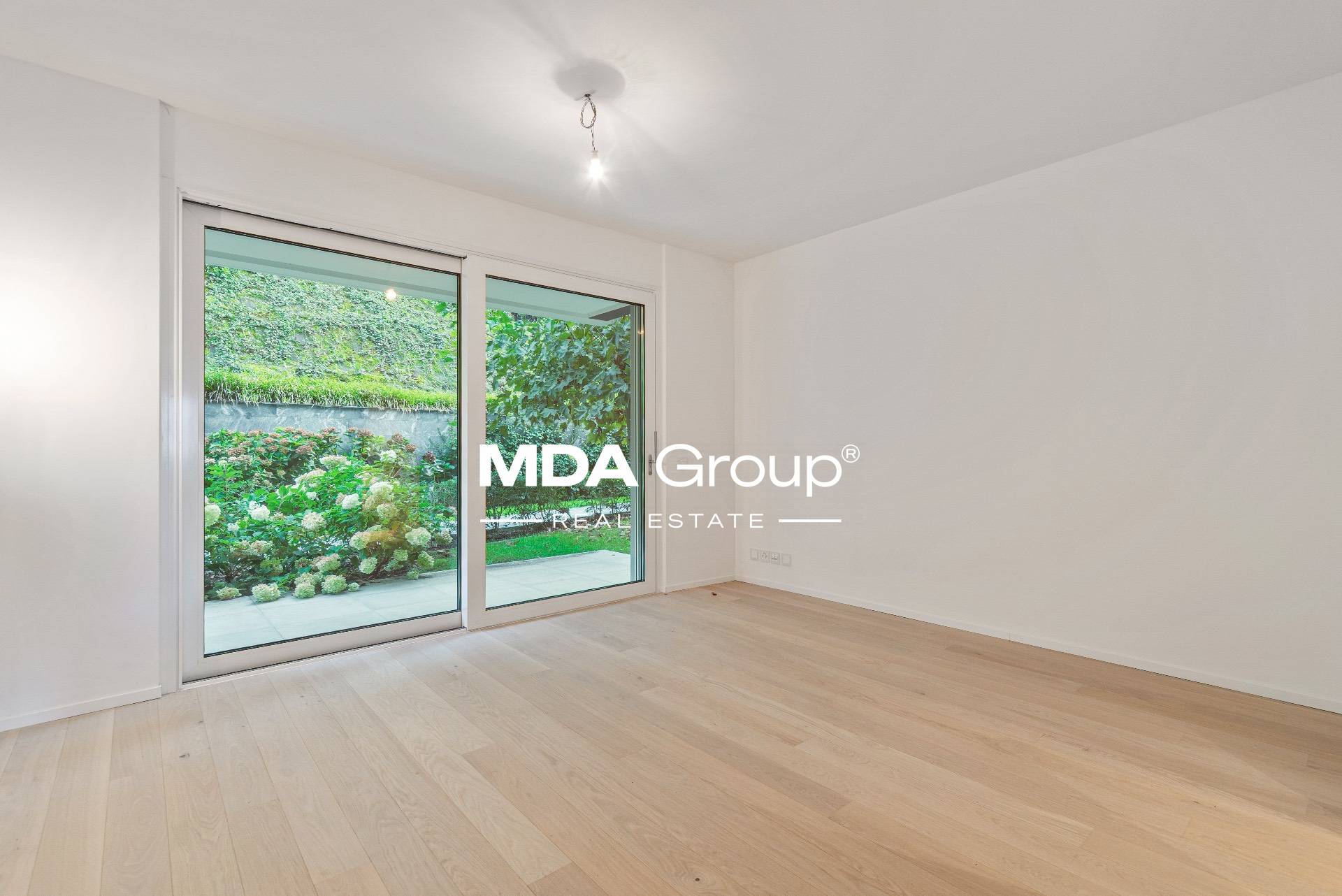 MAGNIFICO APPARTAMENTO CON GIARDINO IN ESCLUSIVO CONTESTO ALBERGHIERO