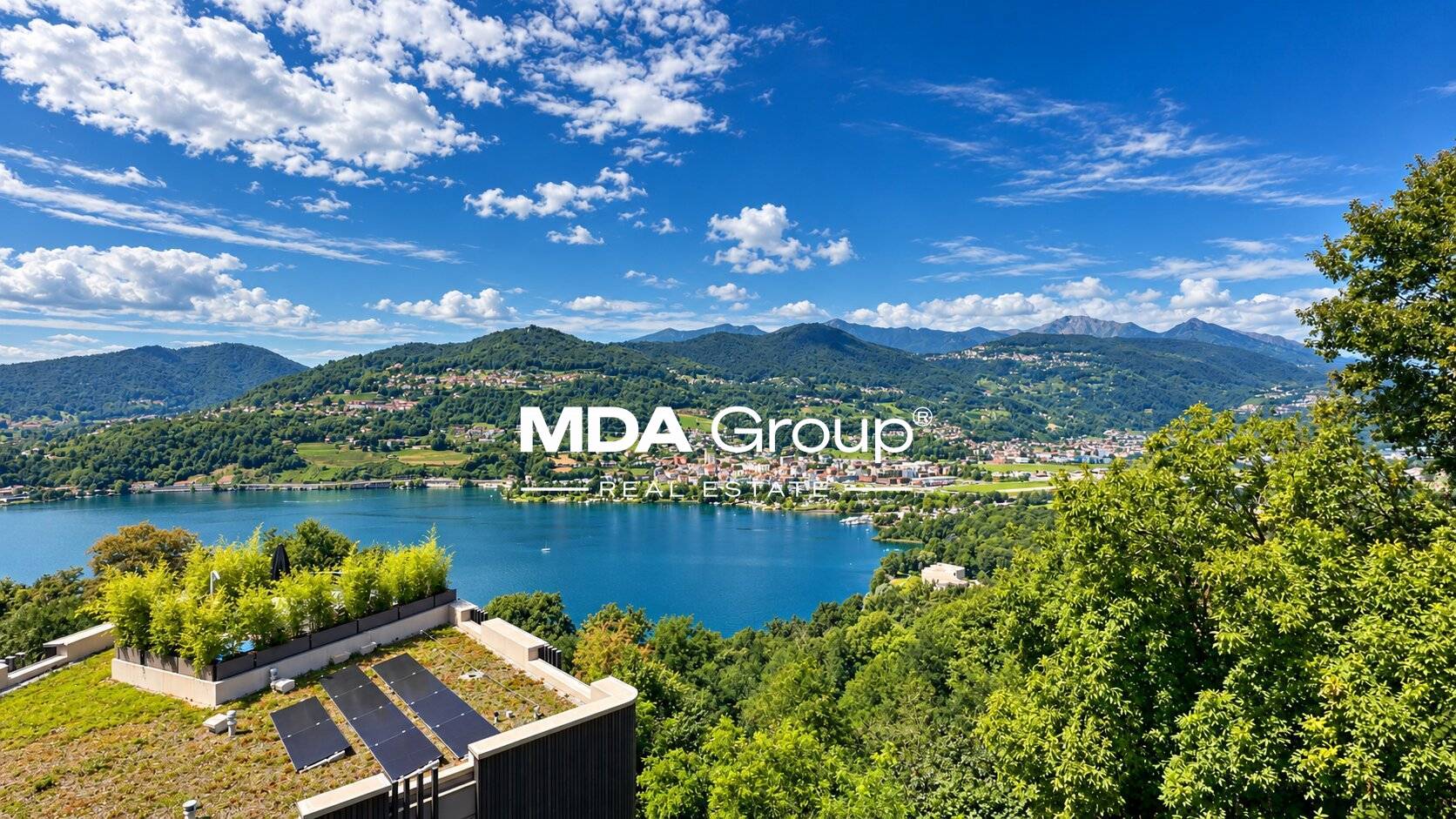 ATTICO CON VISTA LAGO E ROOF GARDEN